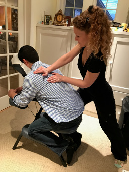 Chair massage technique on the back for an office worker